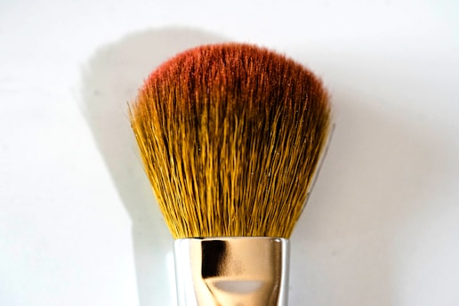 brown and silver makeup brush