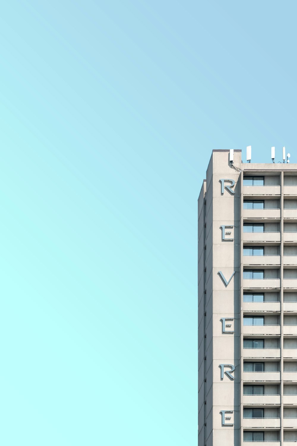 white concrete building under blue sky during daytime