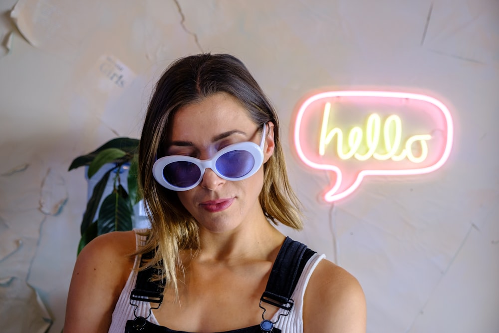 woman in white framed sunglasses