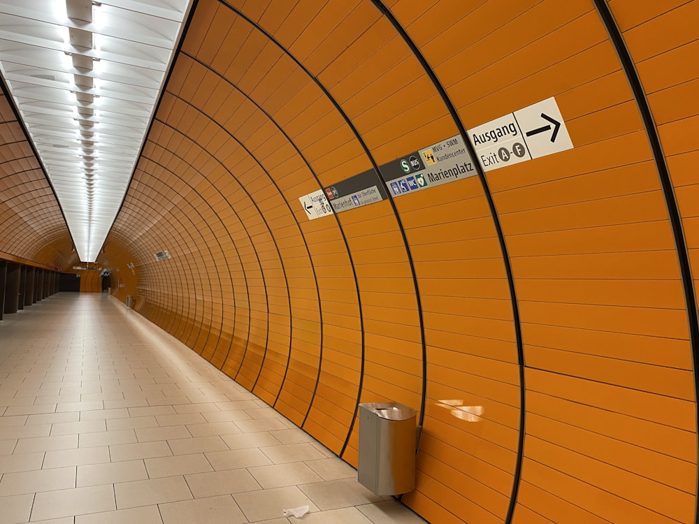 white tiled hallway with no people