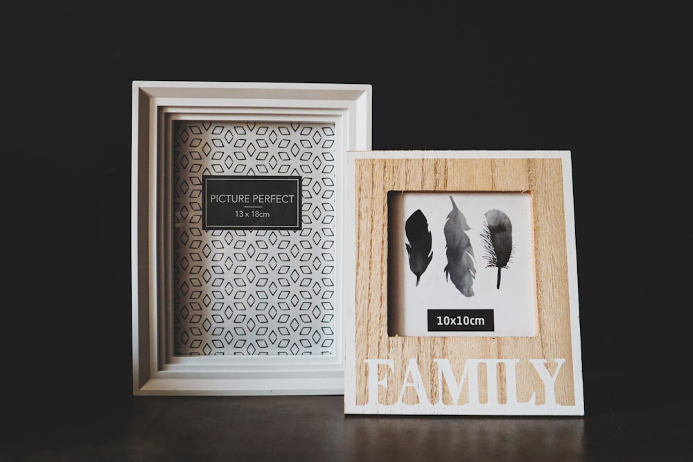 white wooden framed with man in black suit photo