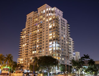 white and brown concrete building during night time