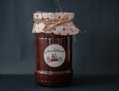 brown and white labeled jar