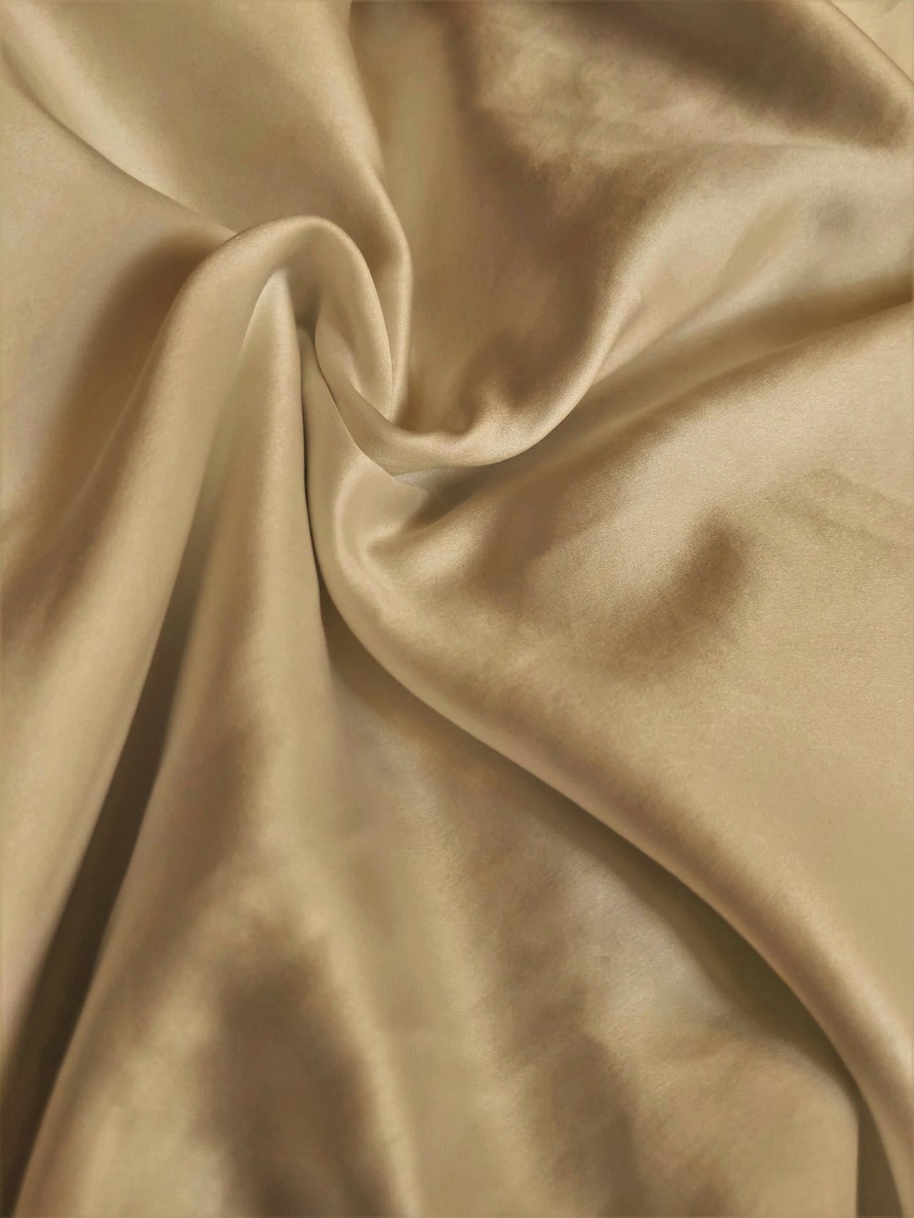 brown textile on white textile