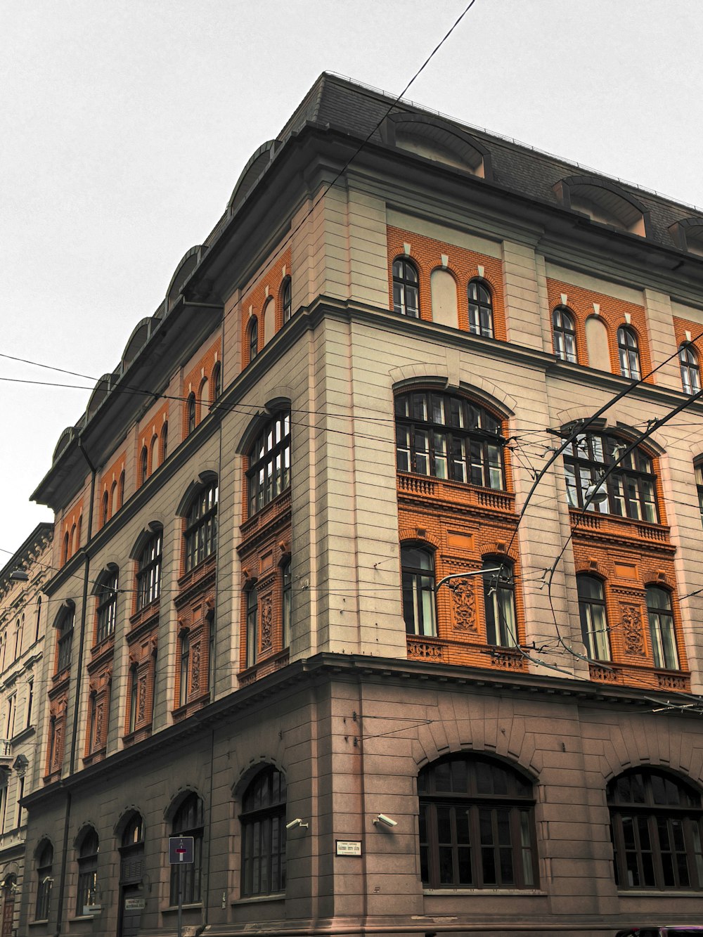 brown concrete building under white sky during daytime