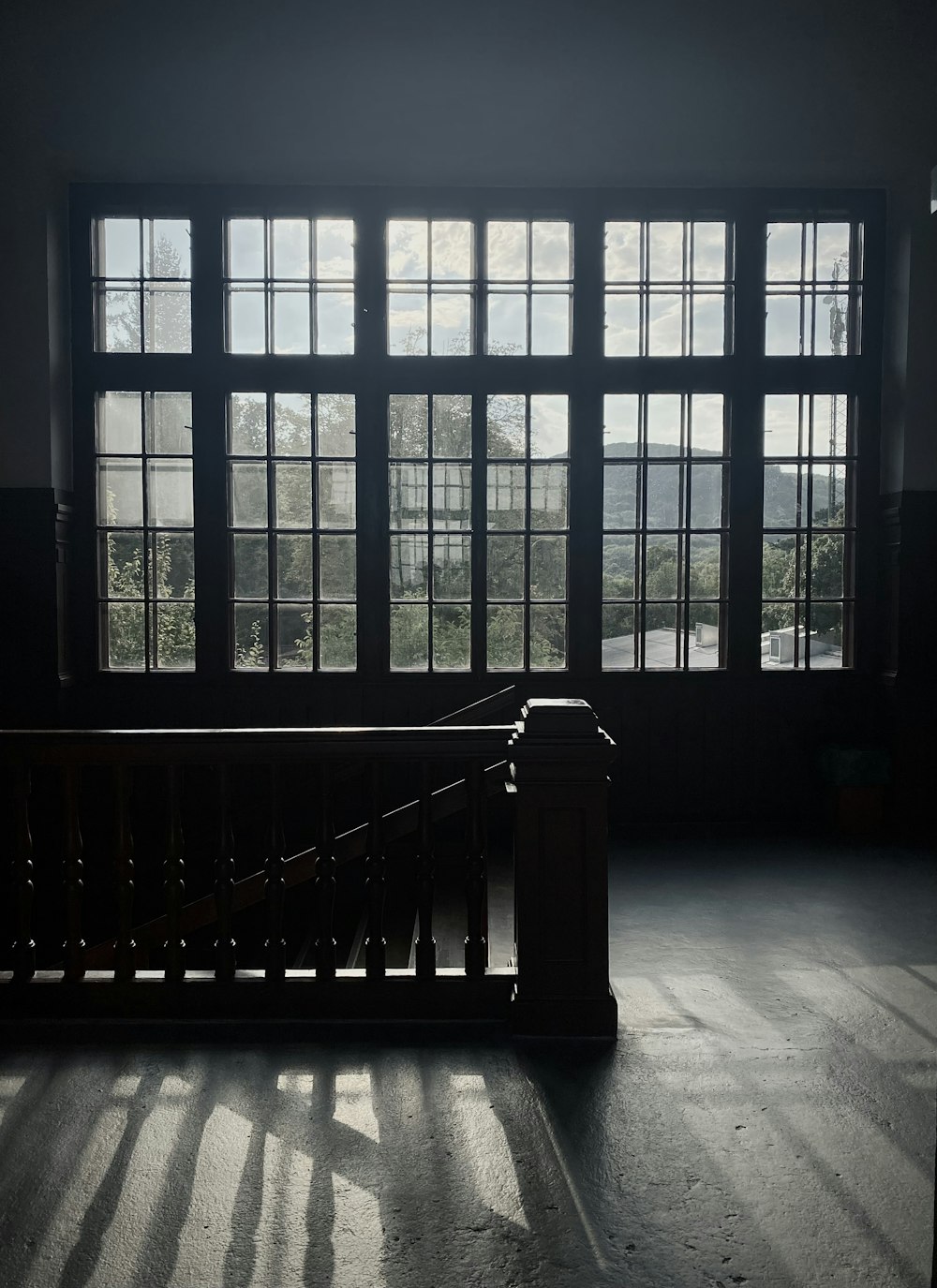 black wooden framed glass window