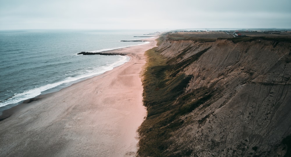 brown sand beach during daytime