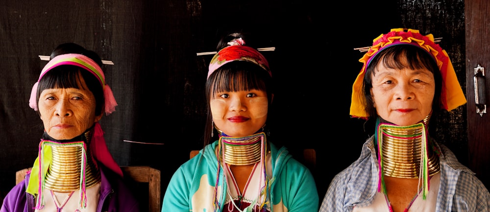 girl in white and red shirt wearing red and white hat