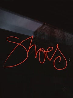 red and white love neon light signage