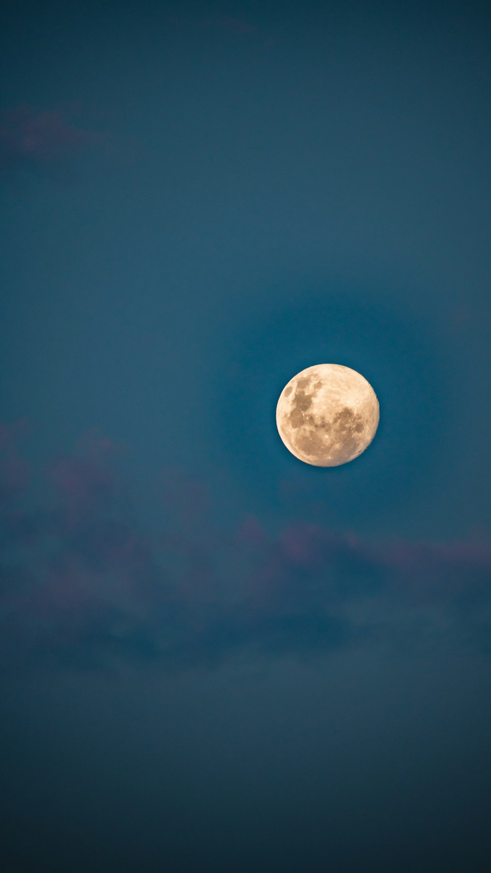 full moon in blue sky