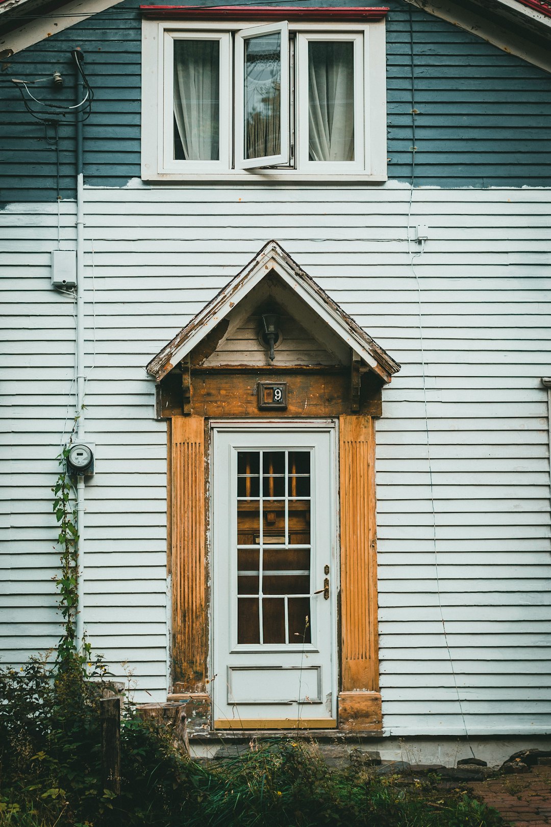 white wooden framed glass window