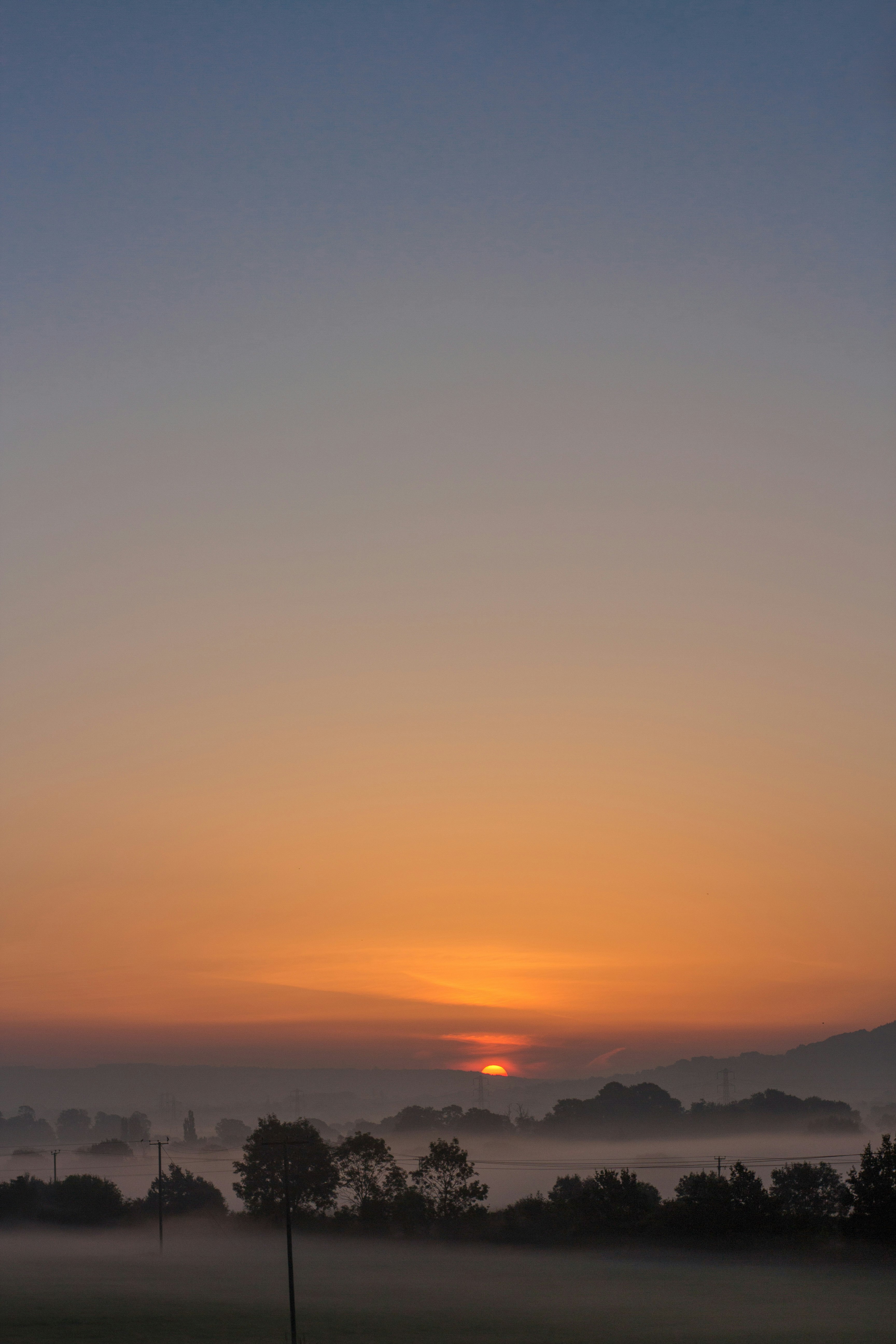 silhouette of mountain during sunset