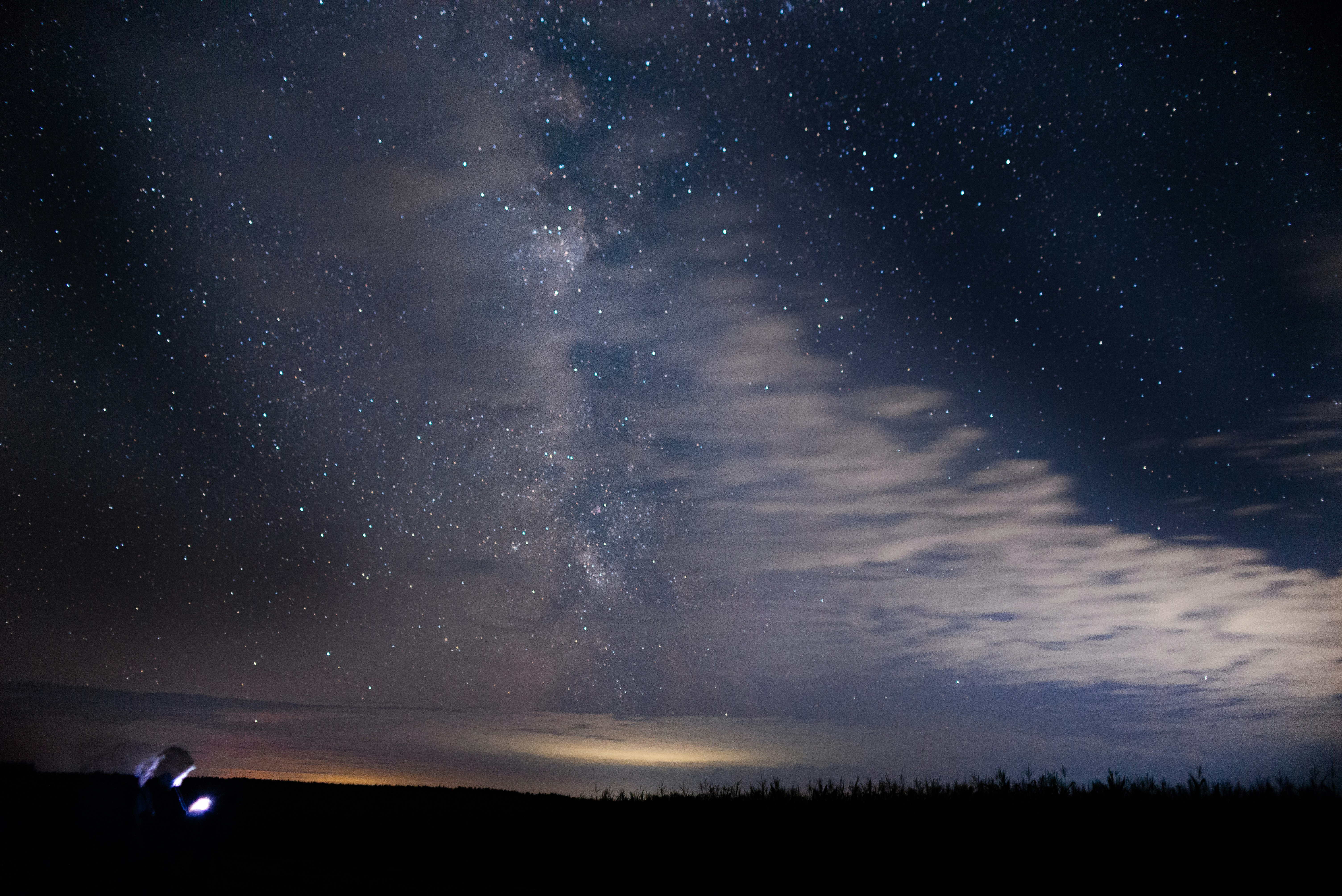 silhouette of mountain under blue sky during night time