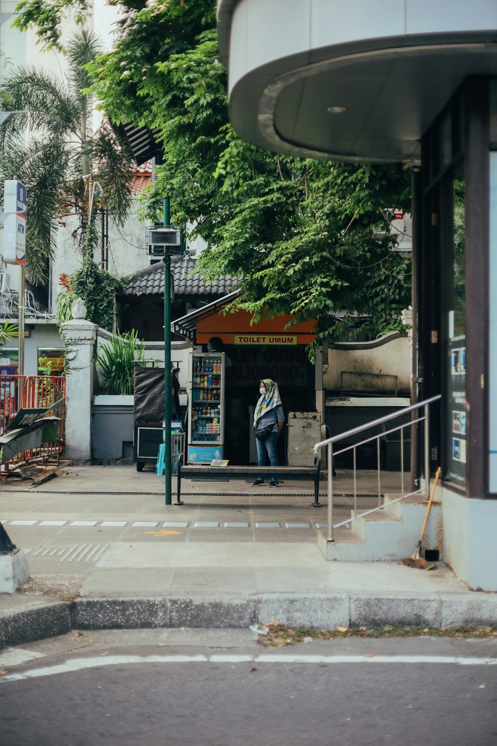 a person standing at the entrance of a building