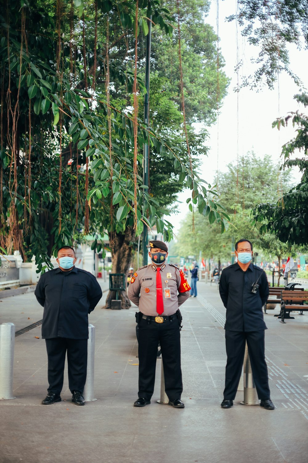 people walking on sidewalk during daytime