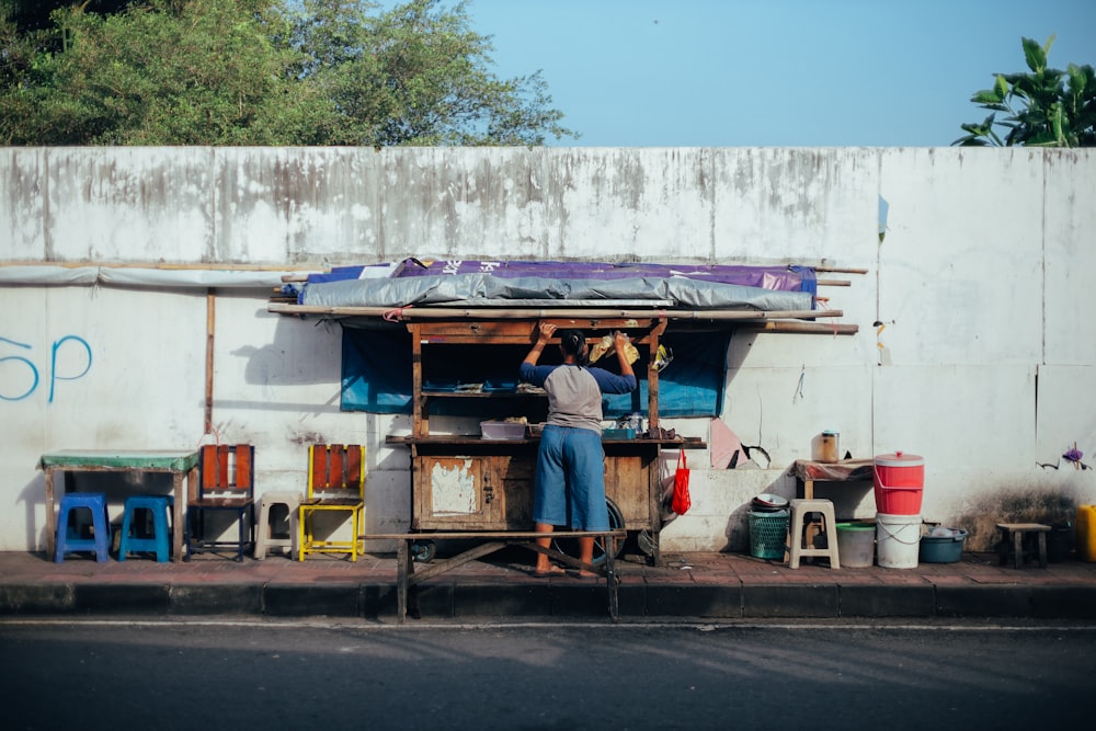 brown wooden cart on road during daytime