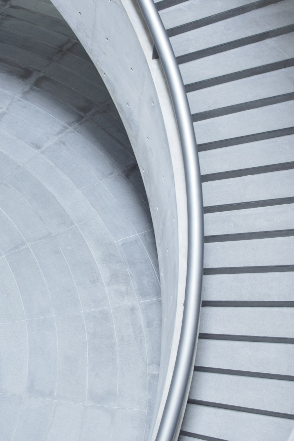 white metal spiral staircase during daytime