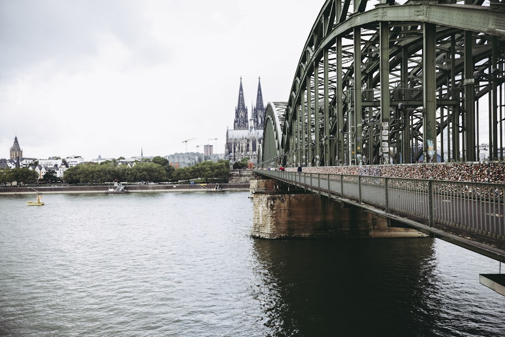 gray metal bridge over river during daytime