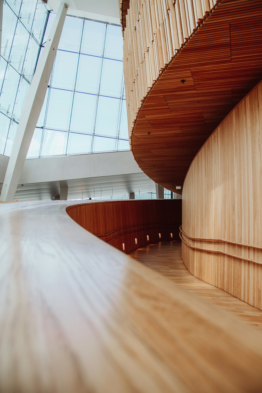 brown wooden tunnel with glass windows