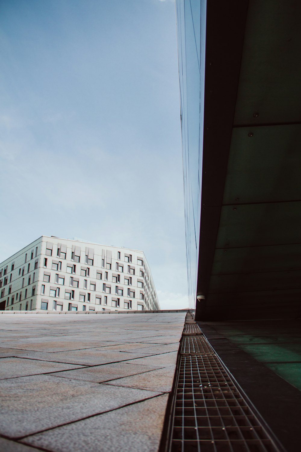 gray concrete building under white sky during daytime