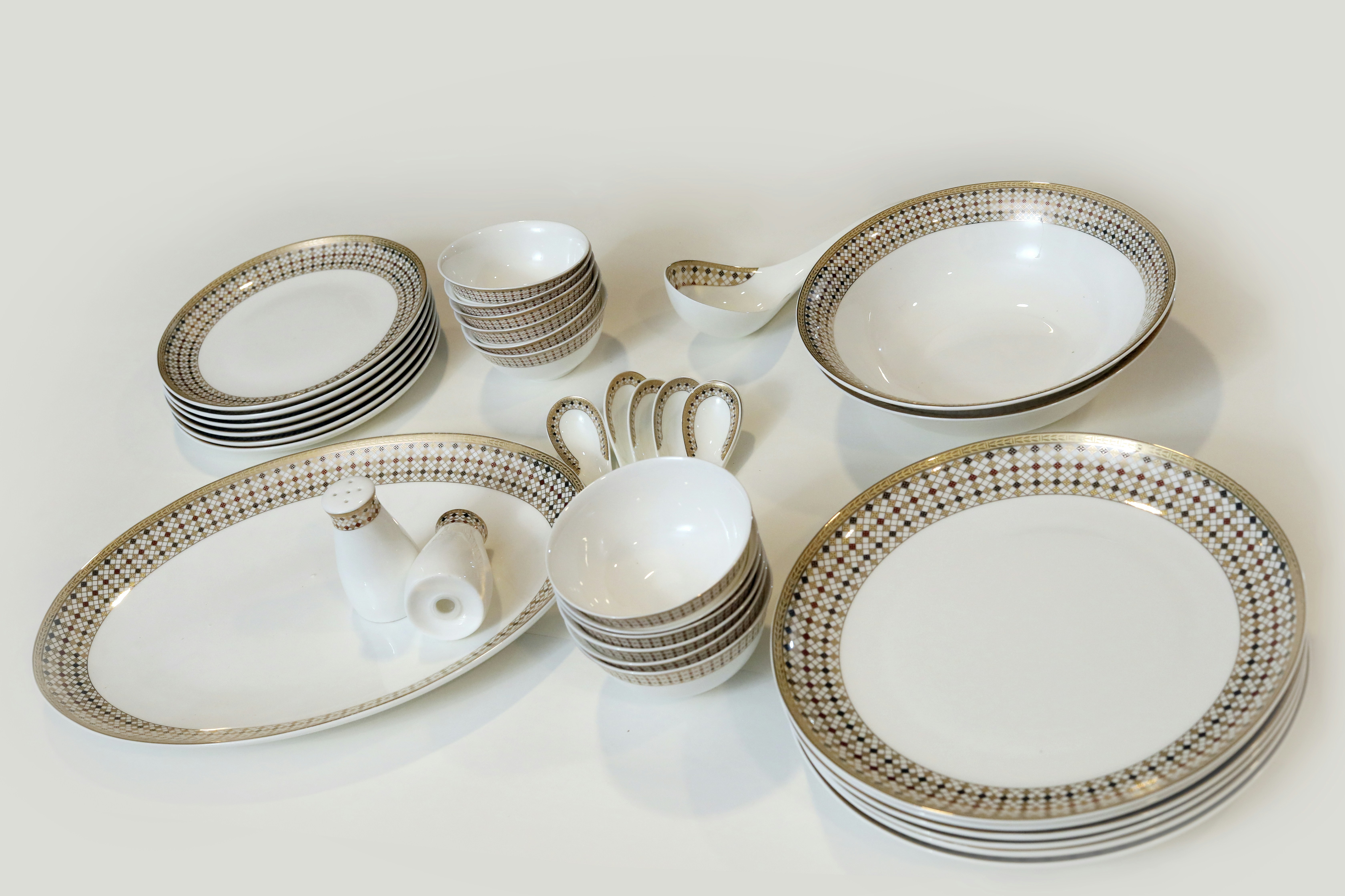 white and black ceramic teacup set