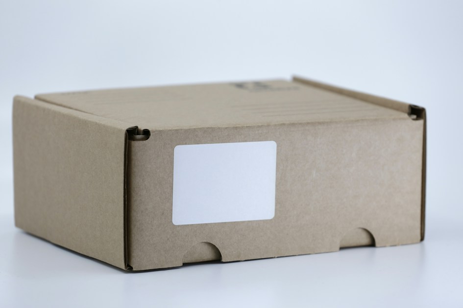 A brown cardboard box on a white table