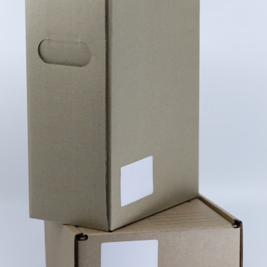gray cardboard box on white table