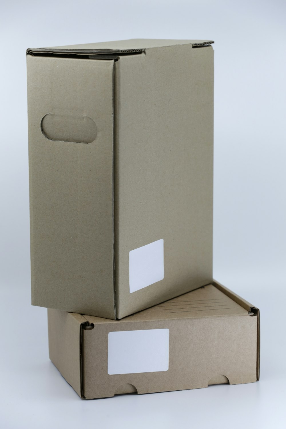 gray cardboard box on white table