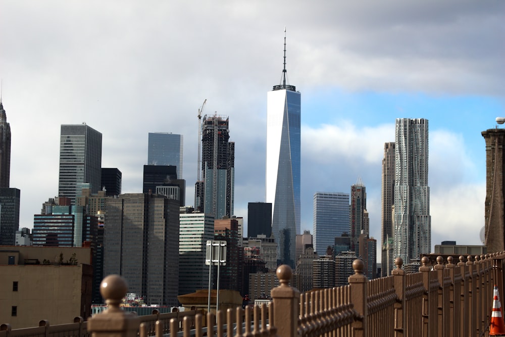 city skyline under gray sky during daytime