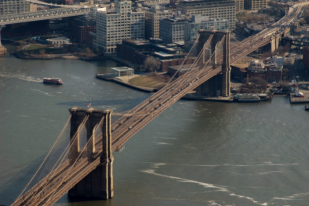 brown bridge over river during daytime