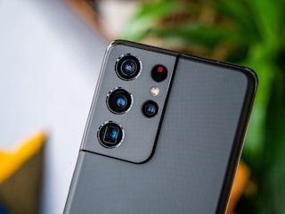 black remote control on gray surface