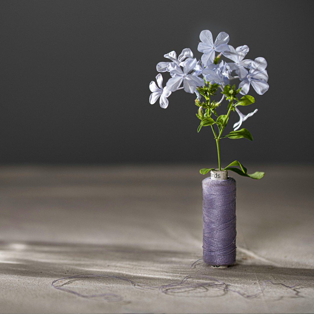 white flowers on gray rolled textile