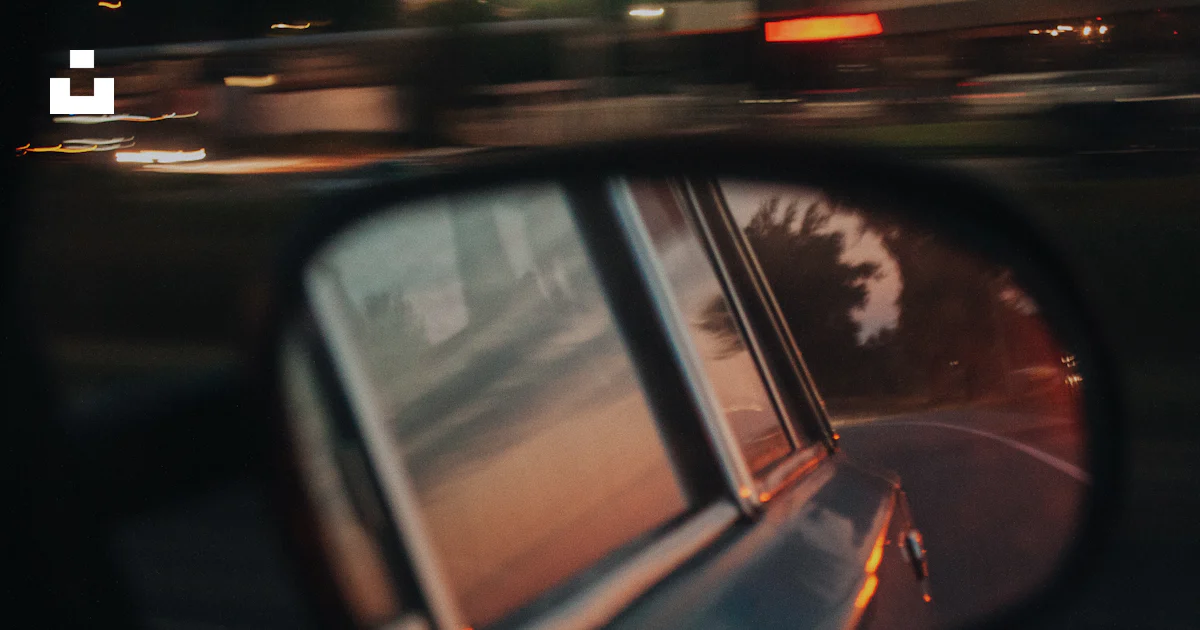Black car side mirror showing red light photo – Free Car Image on Unsplash