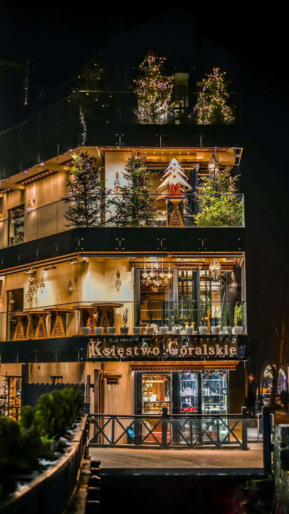 brown concrete building with christmas tree