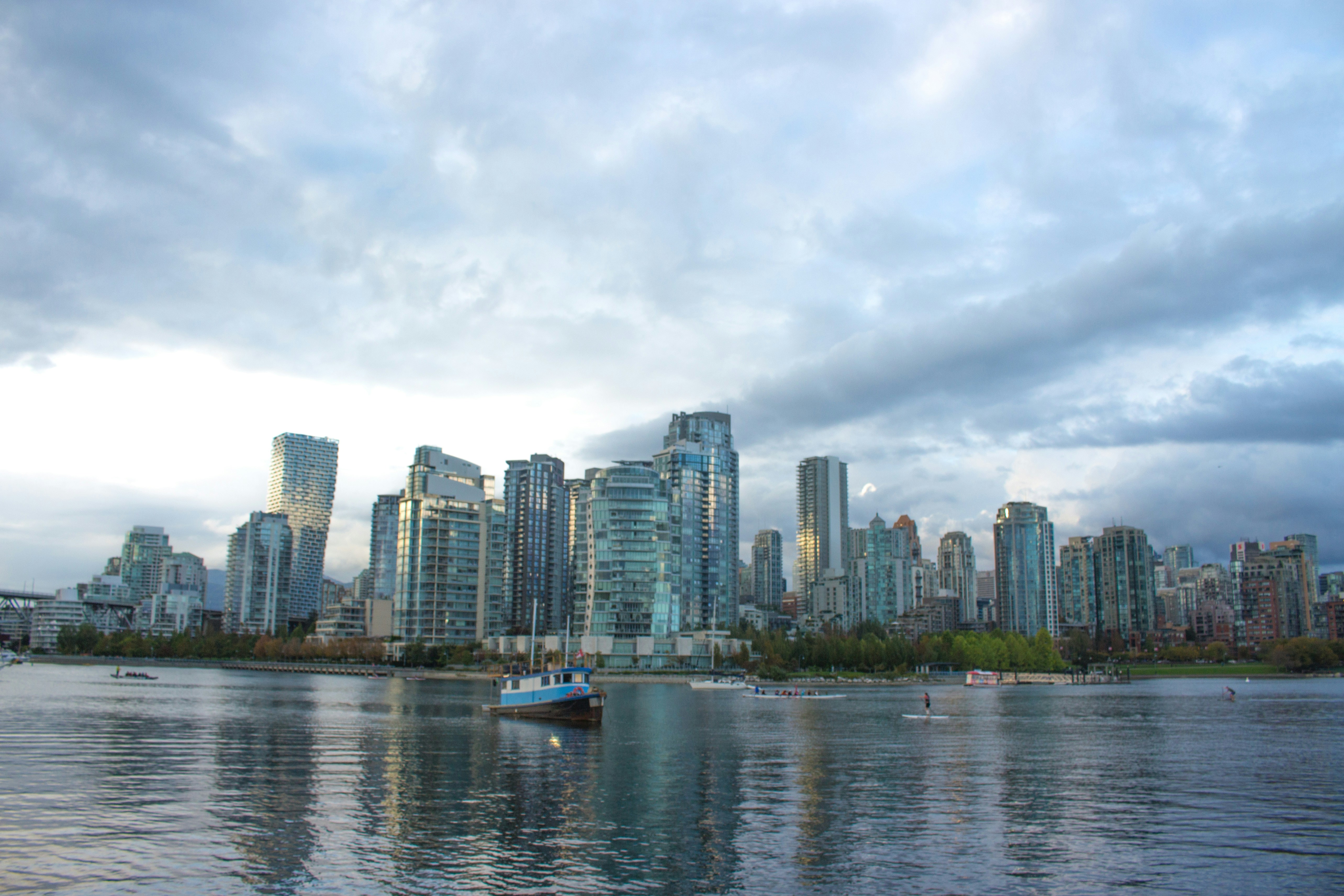high rise buildings near body of water during daytime