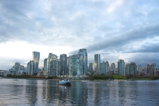 high rise buildings near body of water during daytime