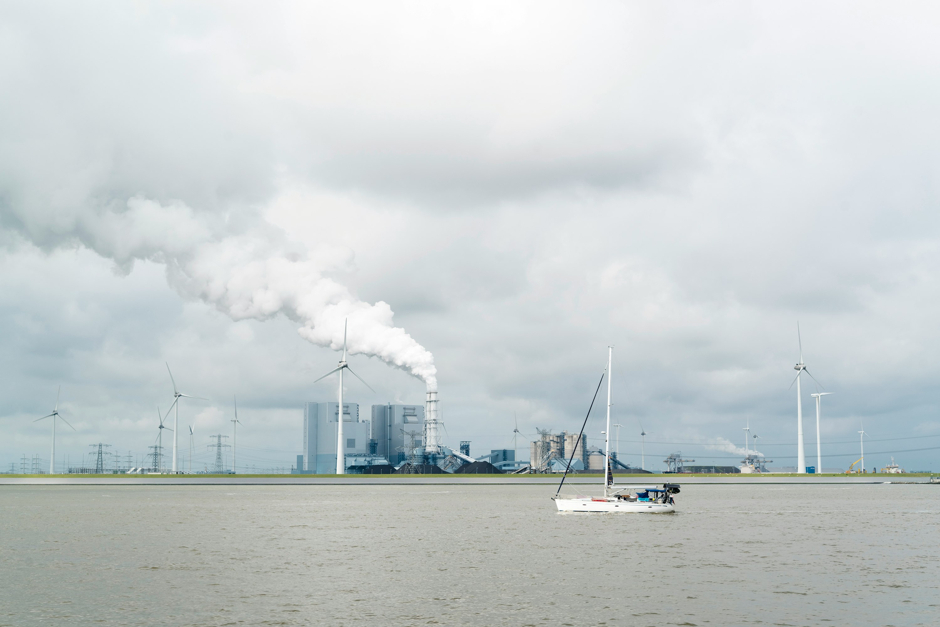 white sail boat on sea during daytime