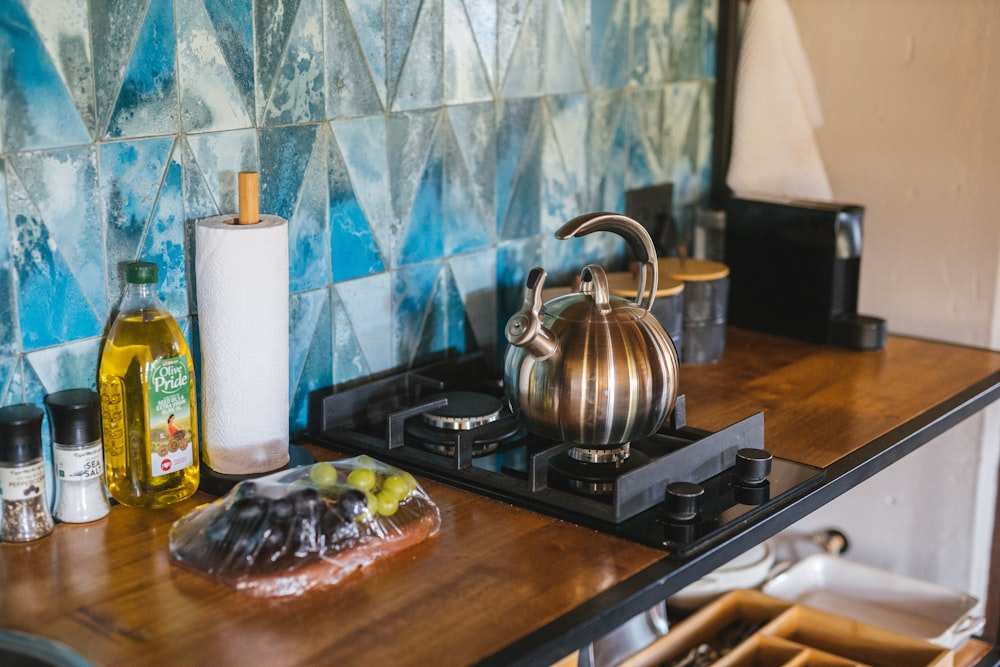 stainless steel kettle on stove