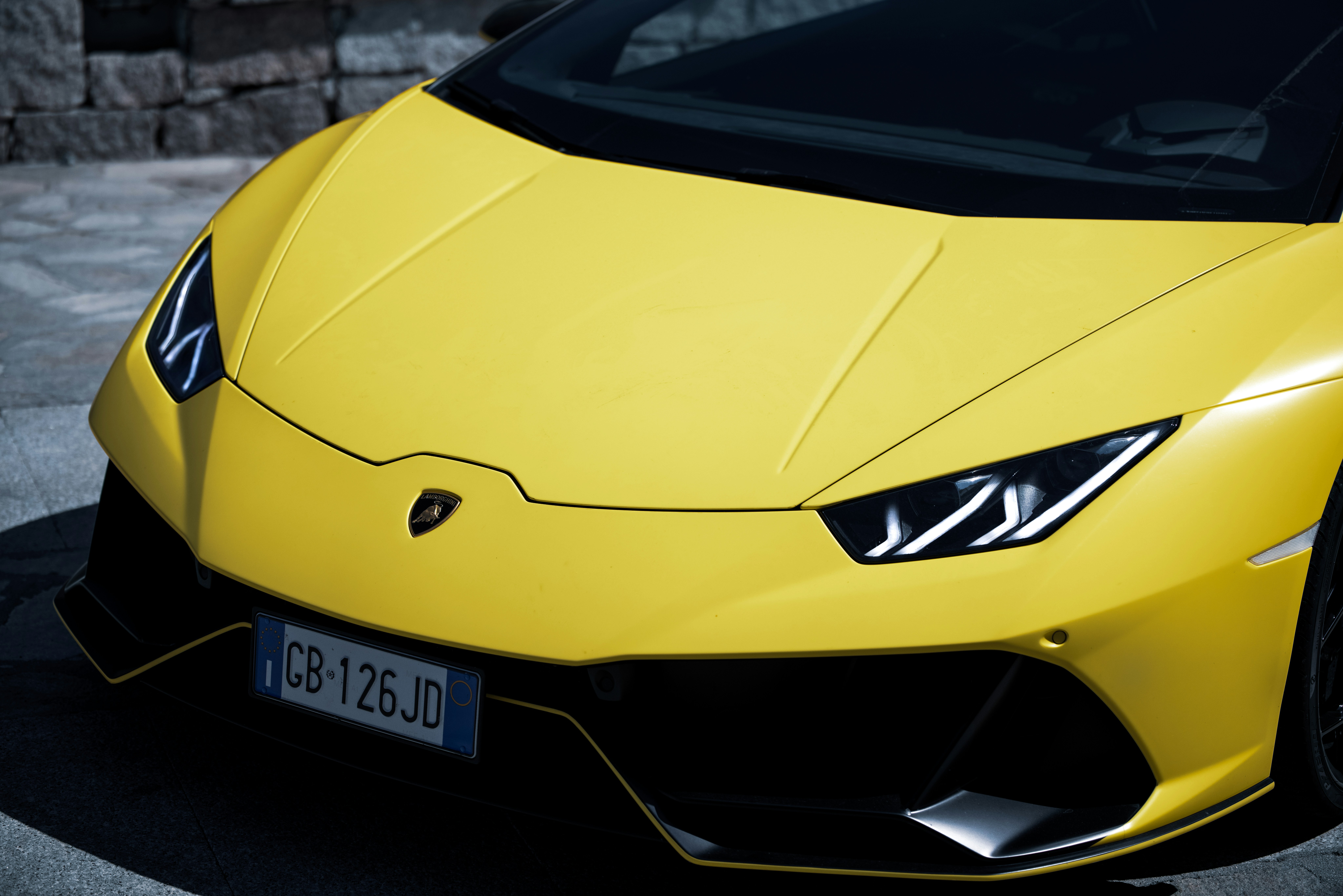 Yellow aventador on road during daytime photo Free Yellow