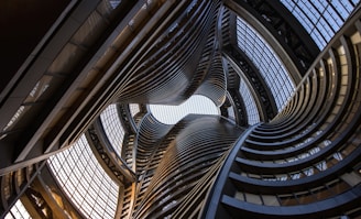 low angle photography of brown and black building interior