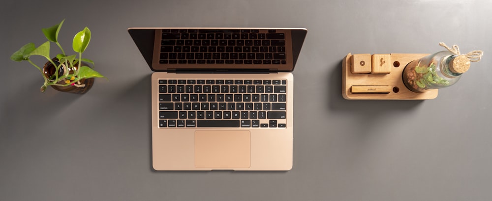 macbook pro on white table