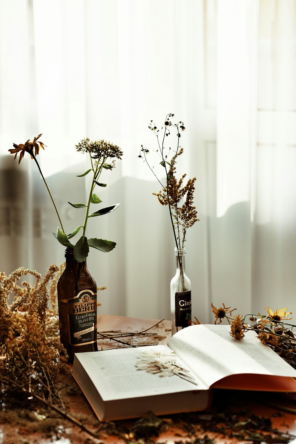 black glass bottle on white table