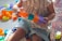 A child engaged in a creative thinking activity with colorful building blocks.
