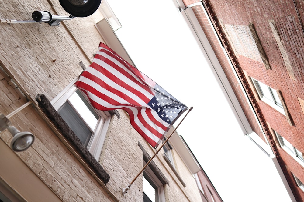 us a flag on brown wooden wall