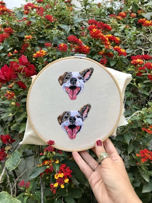 white and black floral heart pillow