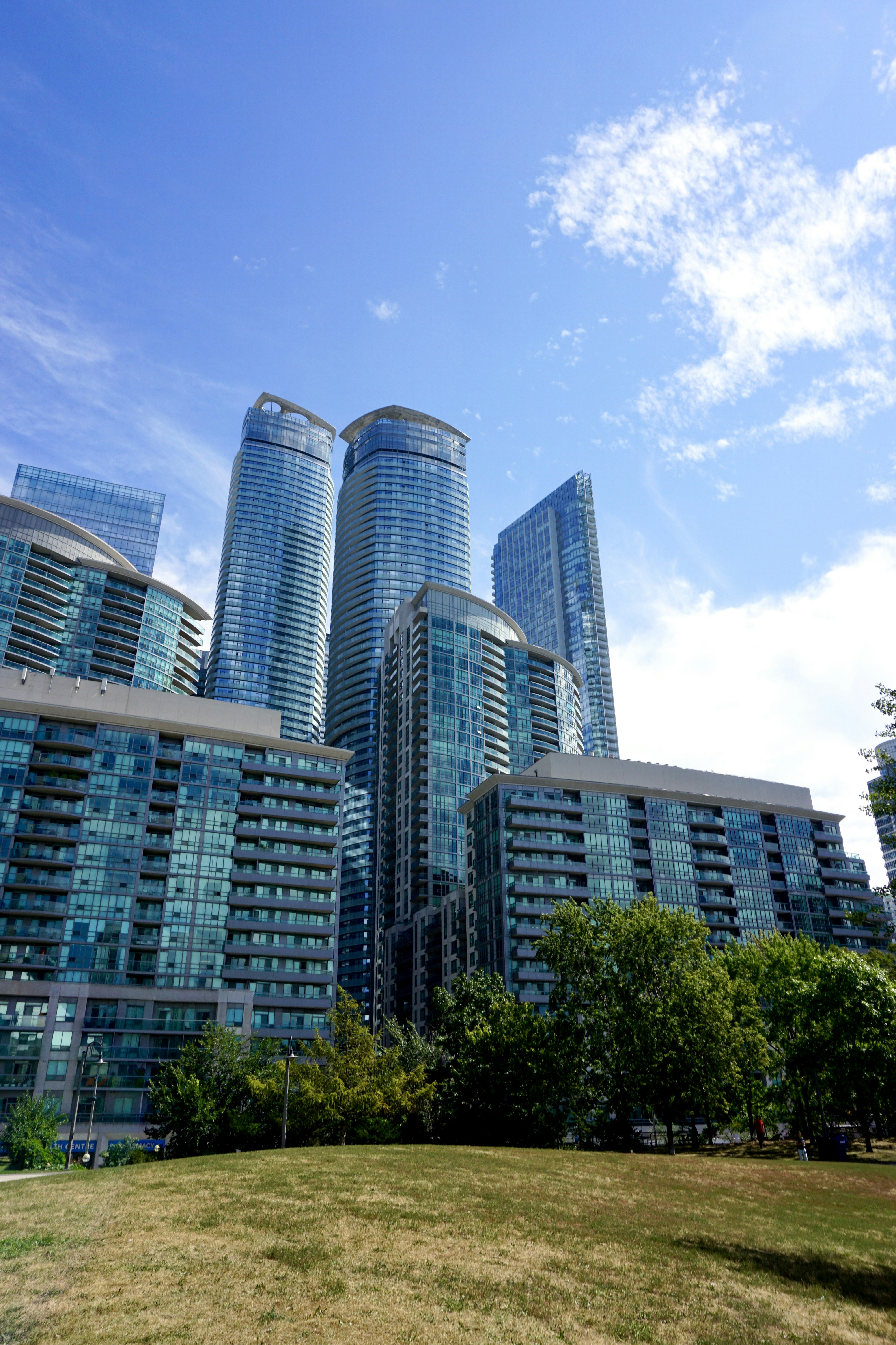white and blue concrete building under blue sky during daytime