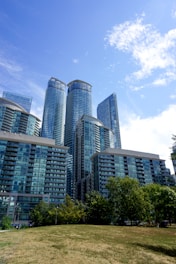 white and blue concrete building under blue sky during daytime