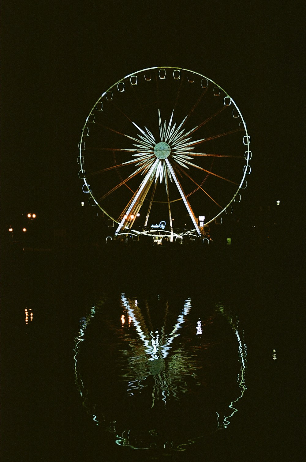 white and blue ferris wheel