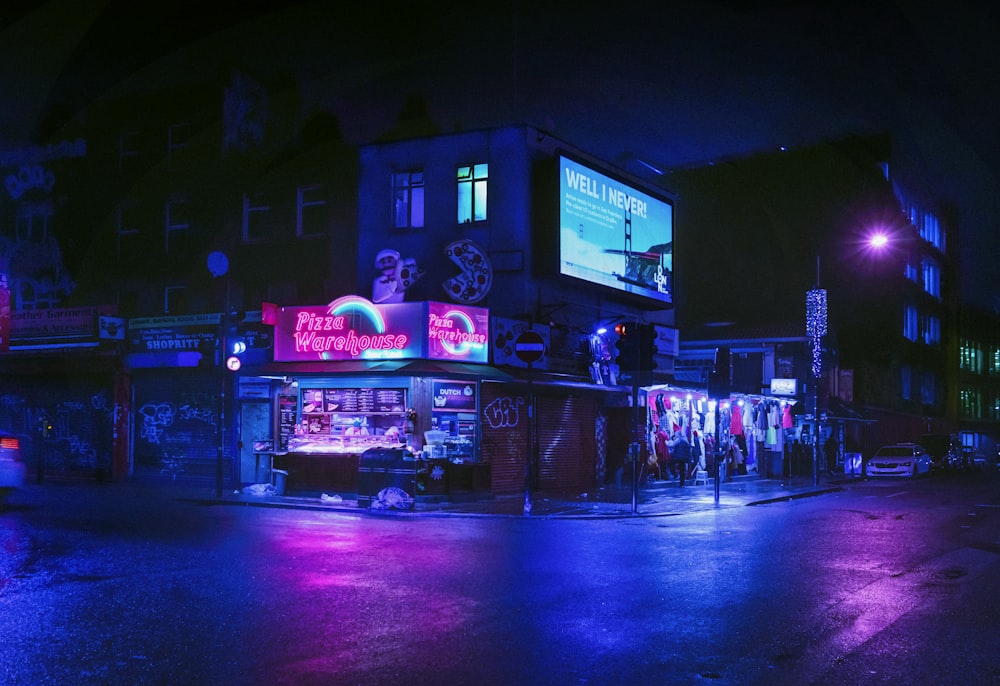 people walking on street during night time