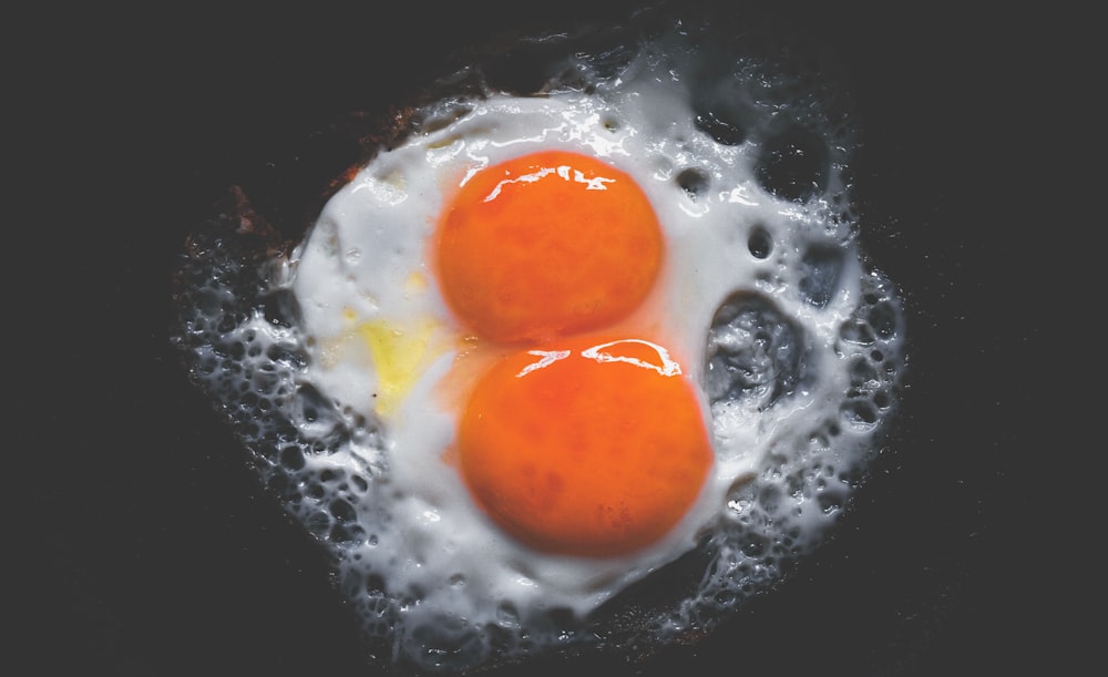 sunny side up egg on gray egg tray